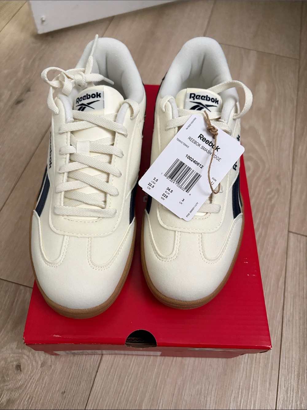 Reebok Smash Edge casual sneakers with a gum sole.